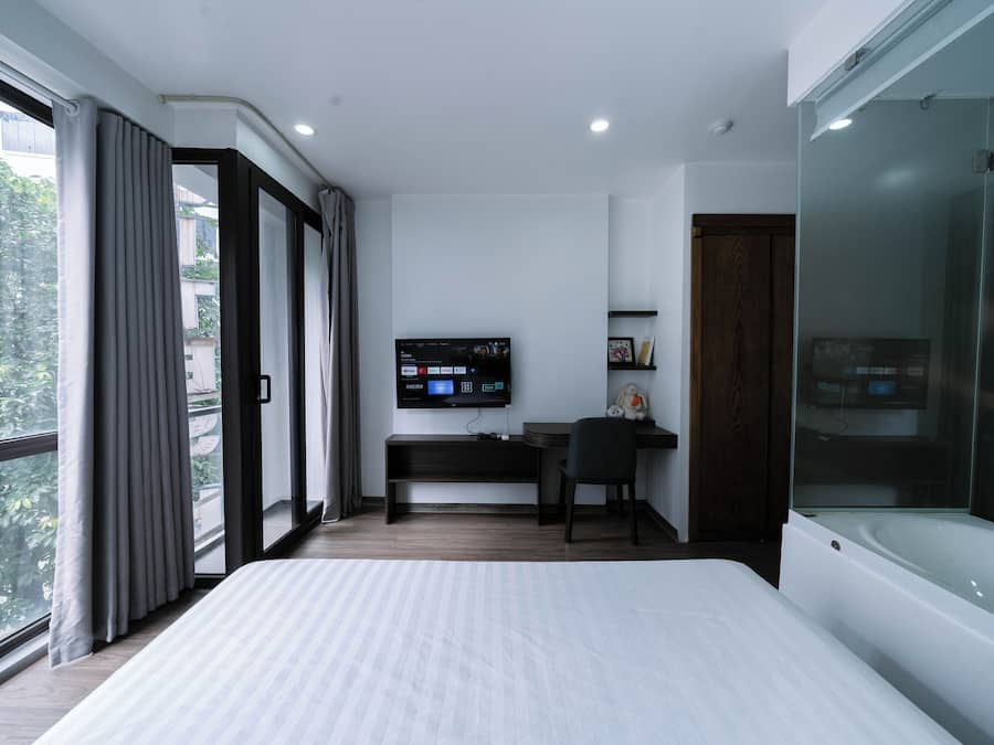 Apartamento luxo, 1 quarto | Escrivaninha, espaço de trabalho para notebook, quartos à prova de som