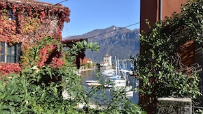 Enjoy a serene lakeside retreat with breathtaking views of the marina and surrounding mountains.