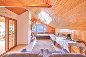 Traditional Apartment, 2 Bedrooms, Balcony, Sea View | Living room | 42-inch flat-screen TV with satellite channels, LED TV, ping pong