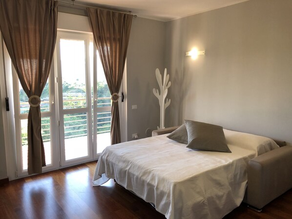 1 غرفة نوم ومكواة/لوح كي وواي فاي وملاءات أسرّة