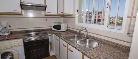 Fridge, microwave, oven, coffee/tea maker