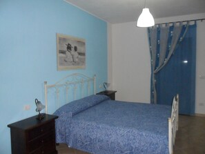 2 dormitorios, tabla de planchar con plancha, wifi gratis y ropa de cama