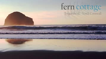 Experience the tranquility of Tregoodwell's coastal scenery from the serene Fern Cottage.