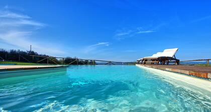 Joli appartement avec WIFI, climatisation, piscine, TV et vue panoramique, prĂšs de San Gimignano