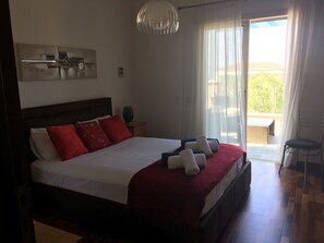 2 عدّة غرف نوم وخزنة داخل الغرفة ومكواة/لوح كي وواي فاي