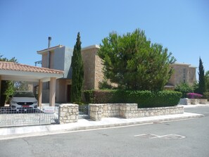 Villa Aphrodite Front garden and Car Port. Private Pool to the rear.