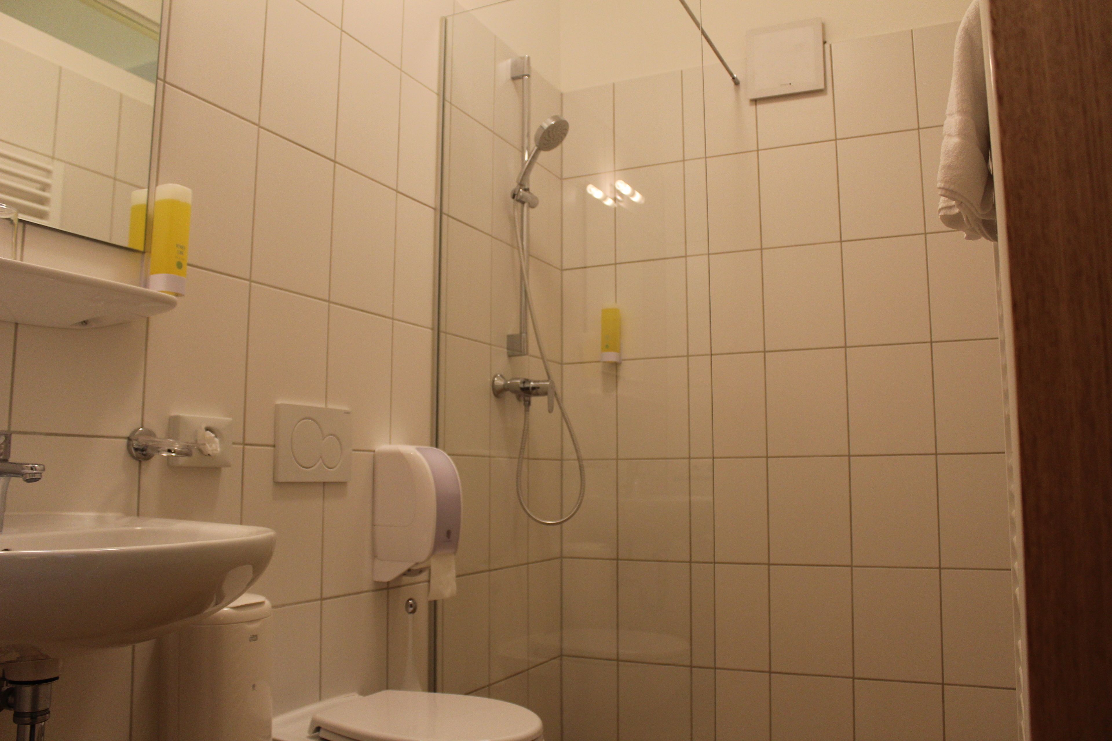 Bathroom | Shower, free toiletries, hair dryer, towels