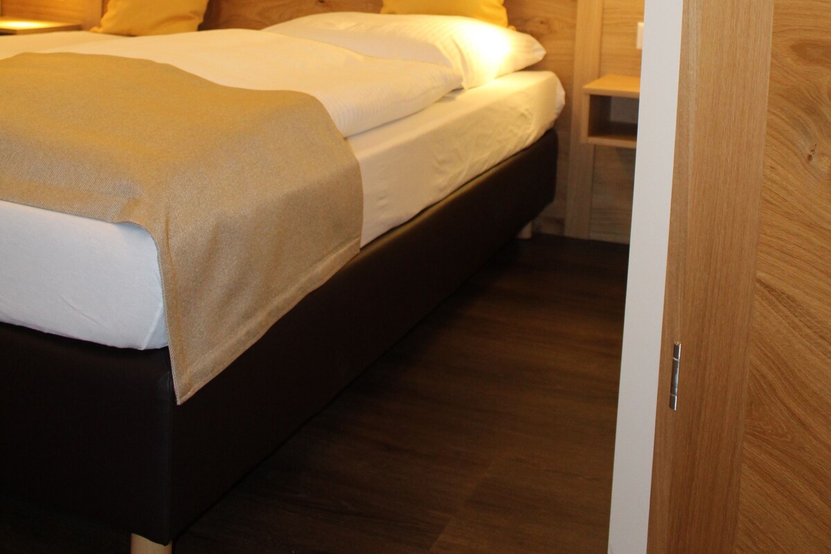 Desk, blackout curtains, soundproofing, cots/infant beds