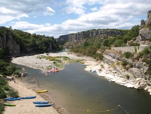 On the beach, sun-loungers