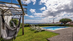 A hammock, a pool, and a view of the sea. - Fisherman's House Azores (São Mateus) (Angra do Heroísmo)