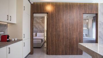 Luxury Suite | Private kitchen | Fridge, stovetop, espresso maker, coffee/tea maker