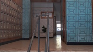 A hallway with lockers on the left, a patterned wall on the right, and a staircase leading to an upper level. - Mira Praia 4- Family, 2 Bedrooms and 2 Bathrooms, Wi-Fi and 80 Meters Beach (Quarteira)