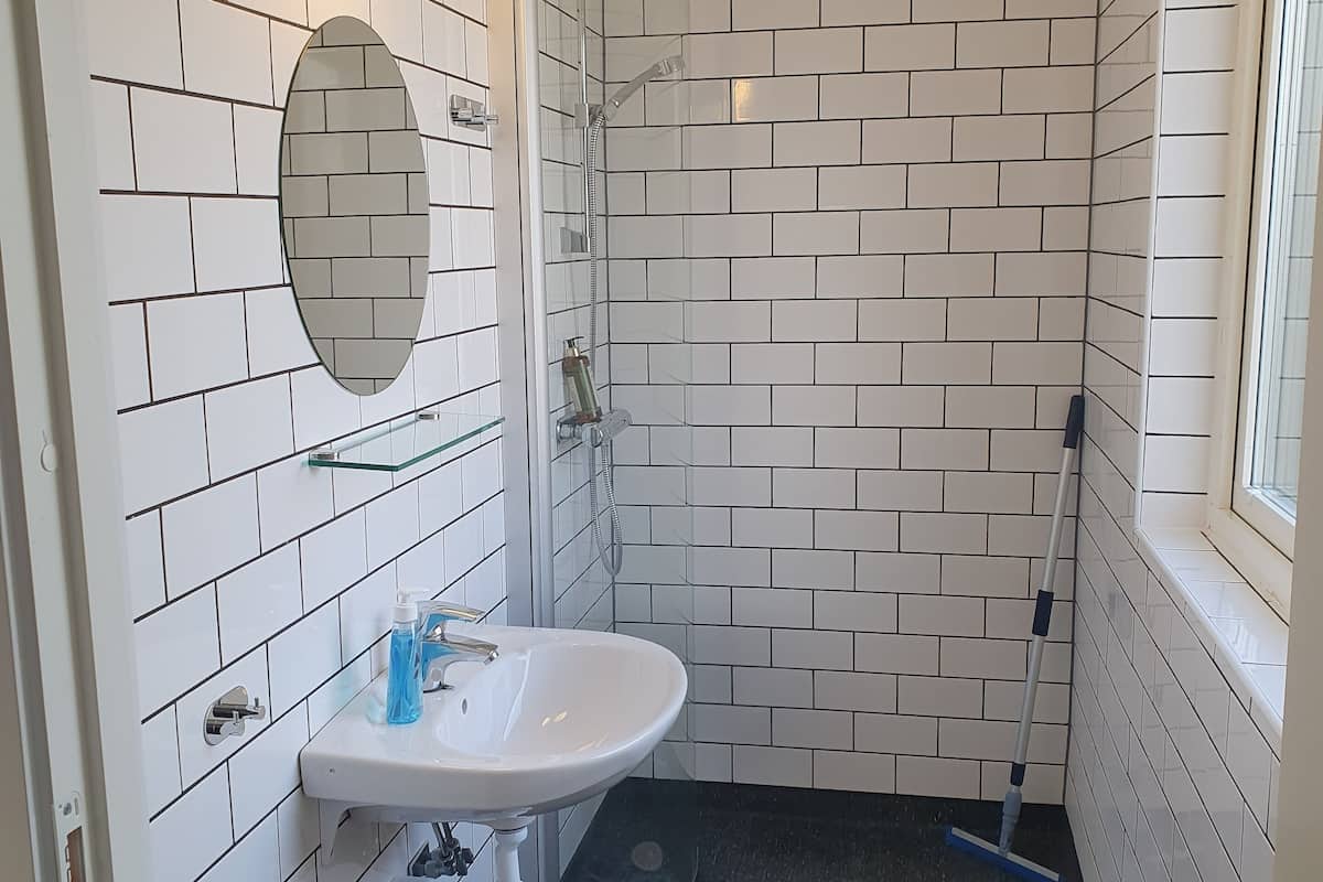 twin room (shared bathroom) | bathroom | shower, free toiletries, hair dryer, towels