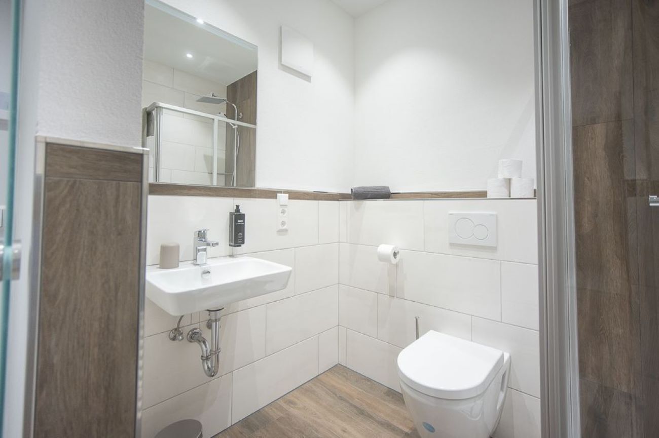 single room | bathroom | hair dryer, towels, soap, shampoo