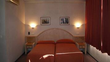 Desk, blackout curtains, soundproofing, free cots/infant beds