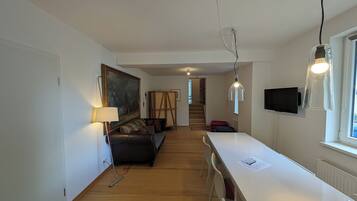 Comfort Apartment, Kitchen (30 EUR cleaning fee included) | Living area | Flat-screen TV