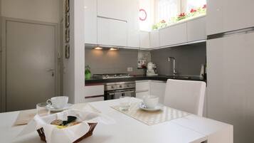 Family Apartment, 2 Bedrooms | Private kitchen | Full-size fridge, microwave, oven, stovetop