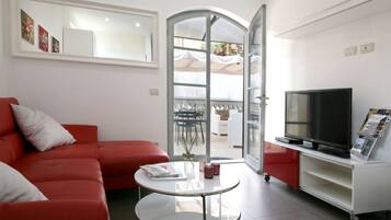 Family Apartment, 2 Bedrooms | Living area | Flat-screen TV