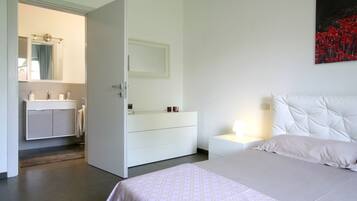 Apartamento família, 2 quartos | 2 quartos, ferros/tábuas de passar roupa, berços grátis