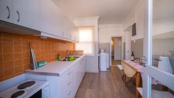 Apartemen | Dapur pribadi | Lemari es, oven, kompor, dan mesin espresso