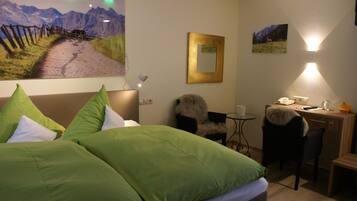 Premium bedding, down comforters, minibar, in-room safe