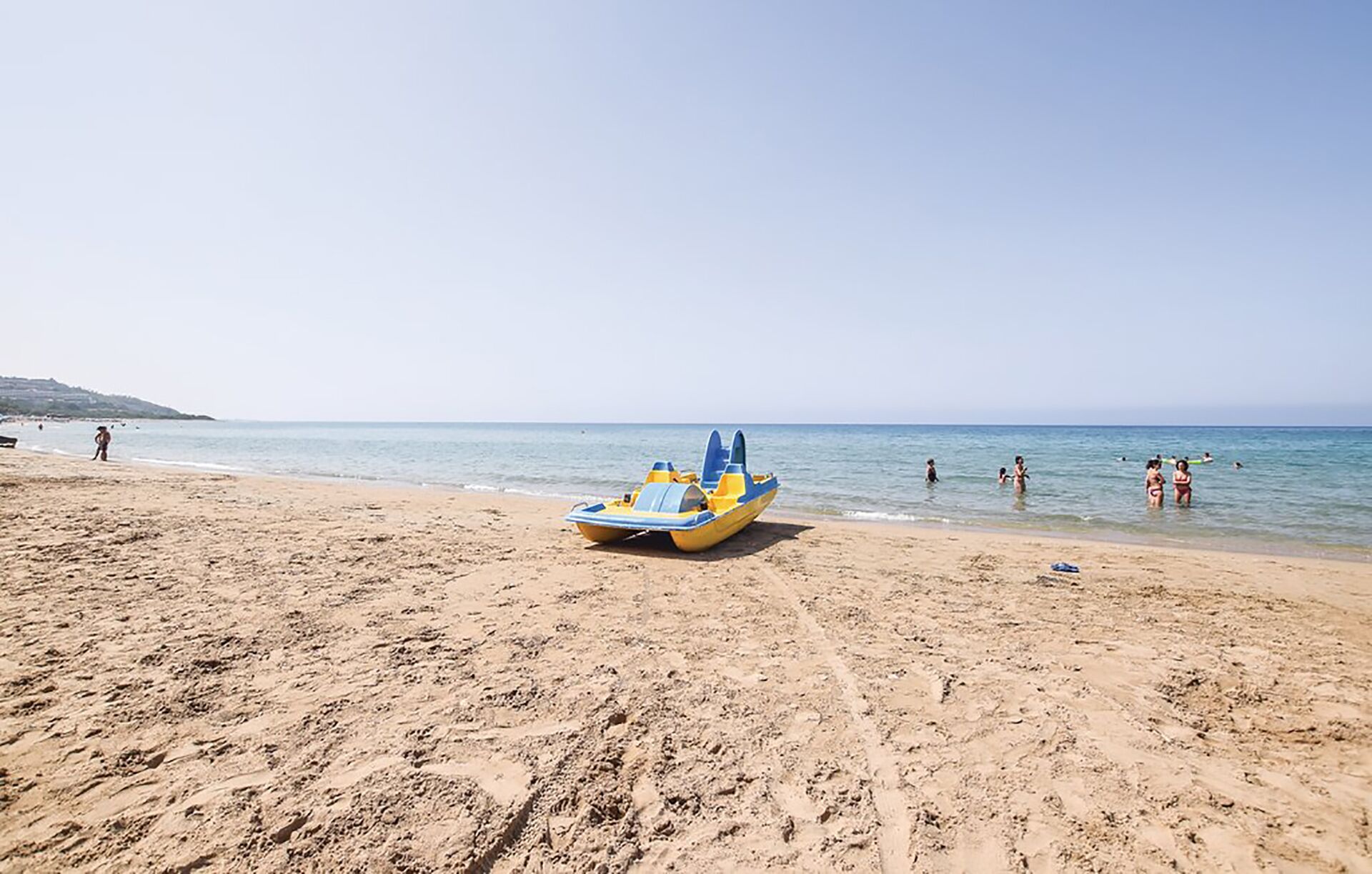 On the beach, sun loungers