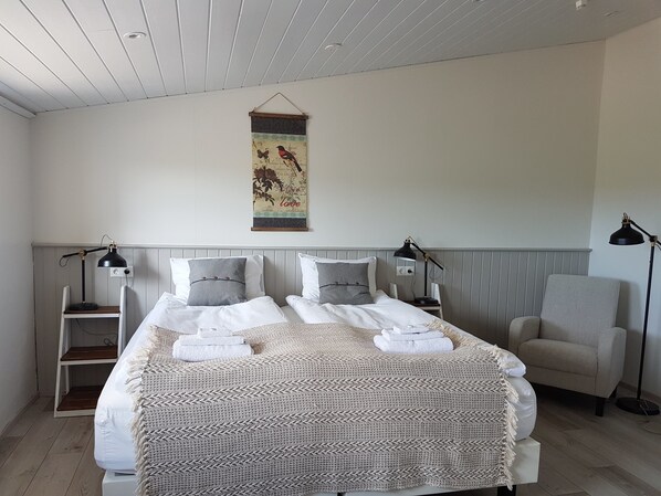 Superior Double Room, Private Bathroom (Fjósið) | Blackout drapes, iron/ironing board (on request), travel crib