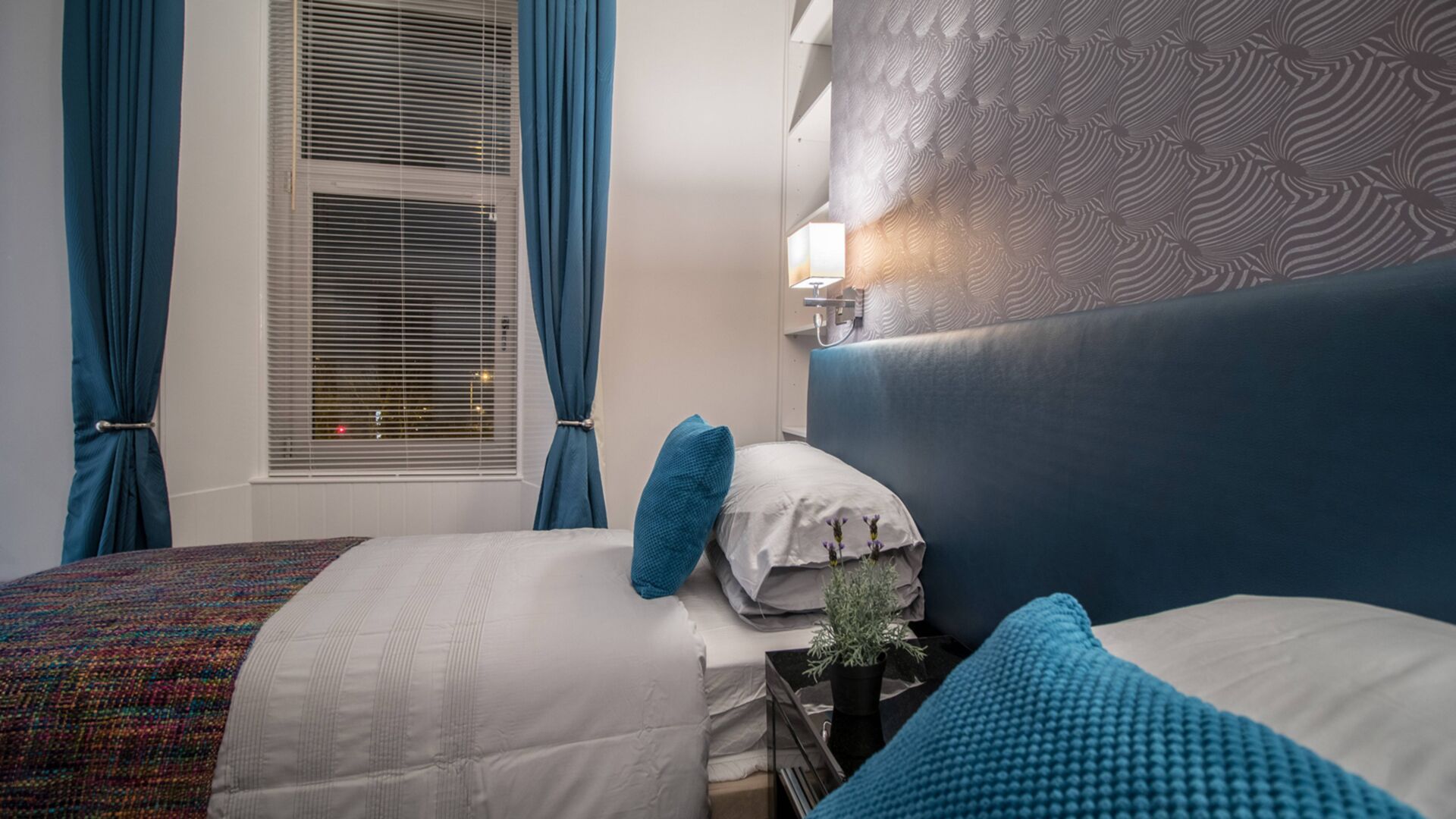 2 bedrooms, desk, blackout drapes, iron/ironing board