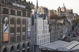 A building with "CITY ART CENTRE" and "MARKET STREET" signs, indicating a location in Edinburgh.