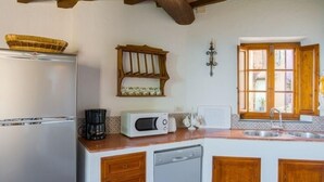 A kitchen with a refrigerator, microwave, toaster, and dishwasher. - Santa Lucia Suite, Lovely View Over the Shore.. (Camaiore)