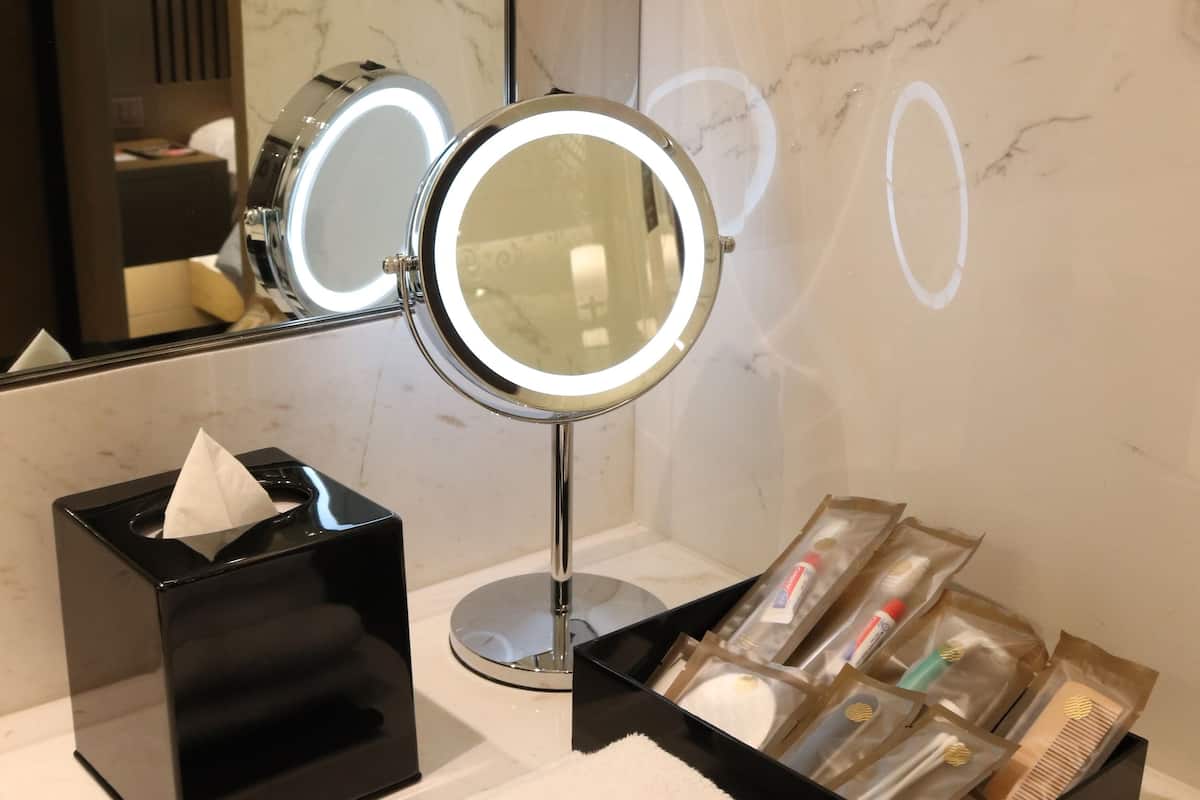 eco-friendly toiletries, hair dryer, bathrobes, slippers