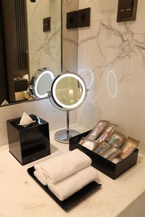 Eco-friendly toiletries, hair dryer, bathrobes, slippers