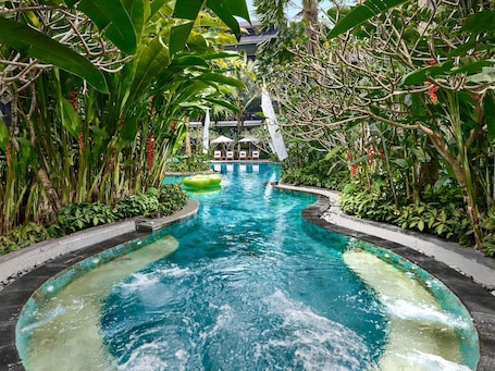 4 outdoor pools, pool loungers. Pullman Ciawi Vimala Hills Resort