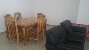 Comfort Apartment, 3 Bedrooms | Living area | 32-inch LCD TV with digital channels, TV - Permiss Ka Apartments (Accra)