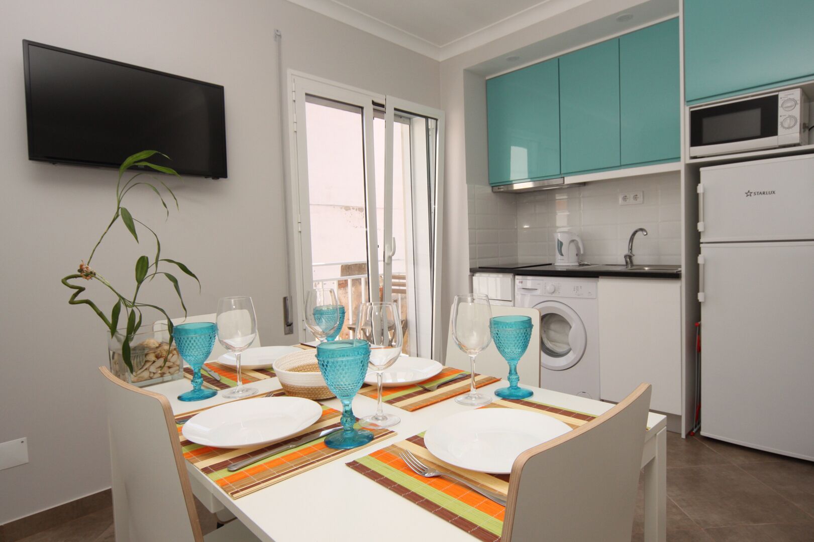 Microwave, stovetop, coffee/tea maker, cookware/dishes/utensils