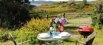 Bracara Cottage with stunning views of Loch Morar.