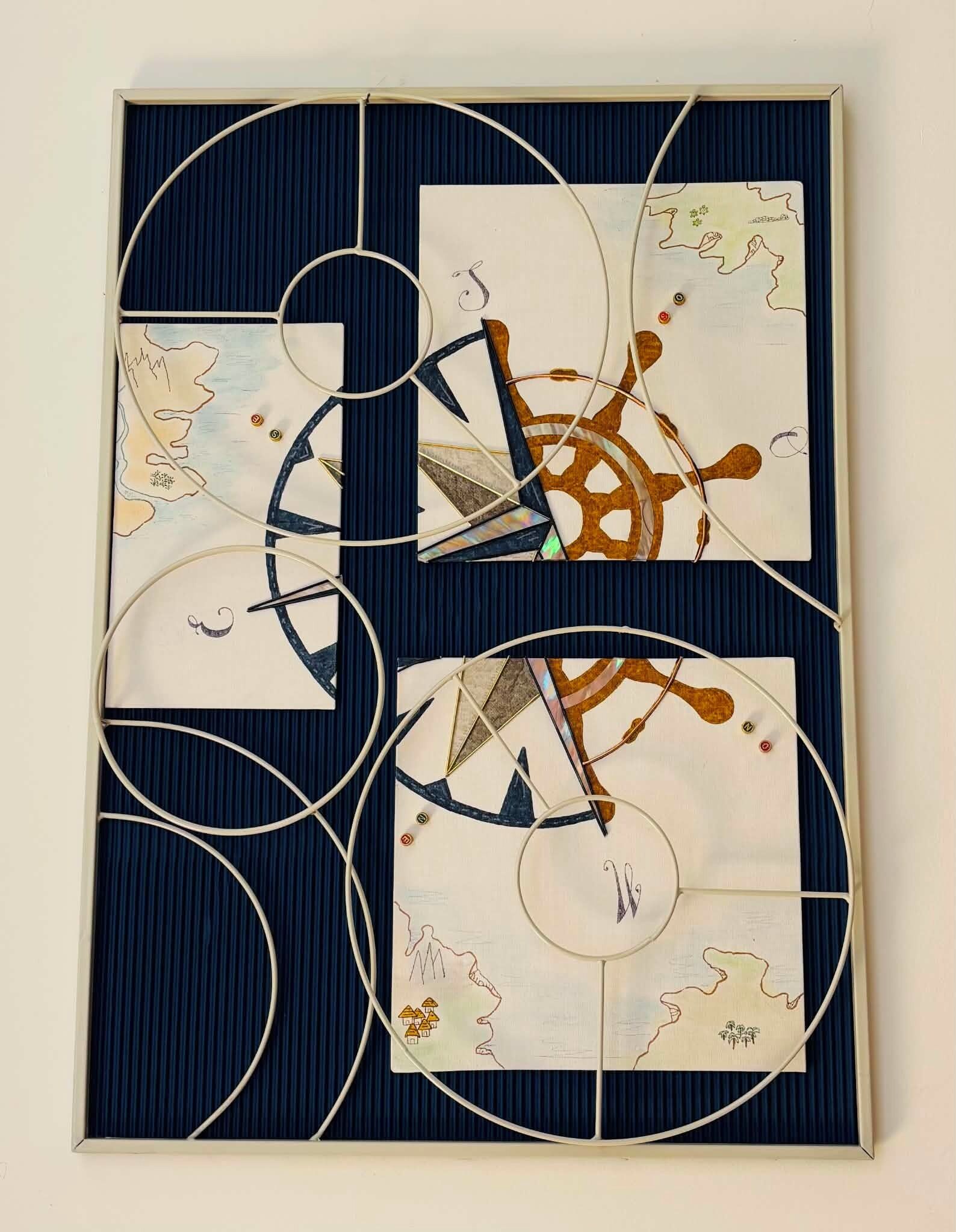 Ein gerahmtes abstraktes Kunstwerk mit geometrischen Formen und einer Windrose.