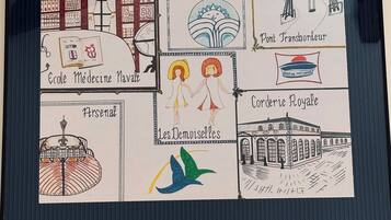 A hand-drawn map of a town with labeled landmarks such as 'Ecole Médicine Navale,' 'HRSenal,' 'Les Demoselles,' 'Pont Transbordeur,' and 'Corderie Royale.'