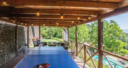 Purgatorio house, a typical Tuscan structure with pool, surrounded by nature.