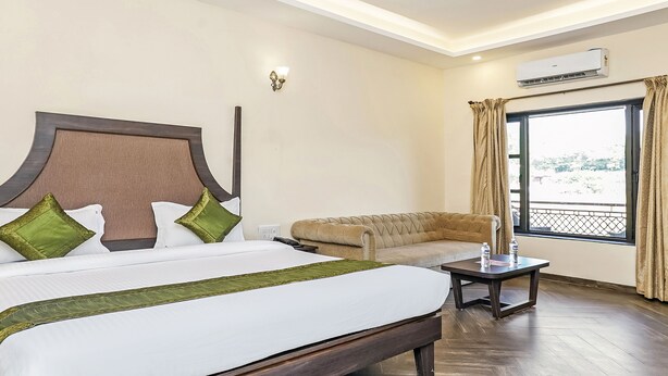 Premium Room, Non Smoking | Iron/ironing board (on request), WiFi (free) - Treebo Trend Rahi Forest View (Mahabaleshwar)