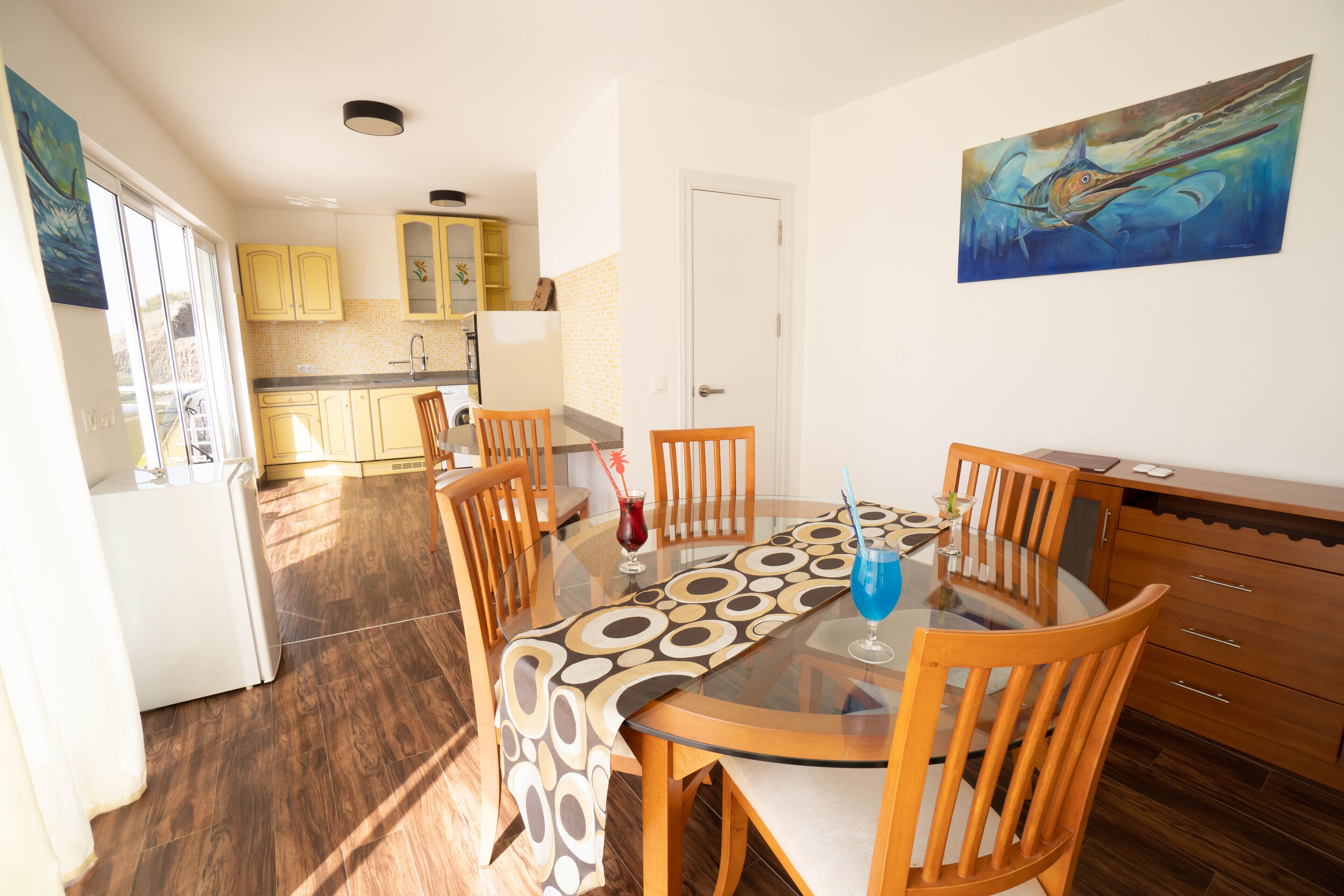 deluxe apartment, 3 bedrooms | living area | flat-screen tv