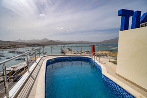 Outdoor pool, sun loungers