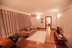 Suite – executive | Oppholdsområde | Flatskjerm-TV