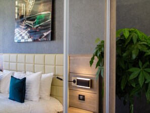 Ropa de cama de alta calidad, colchones con acolchado adicional, minibar