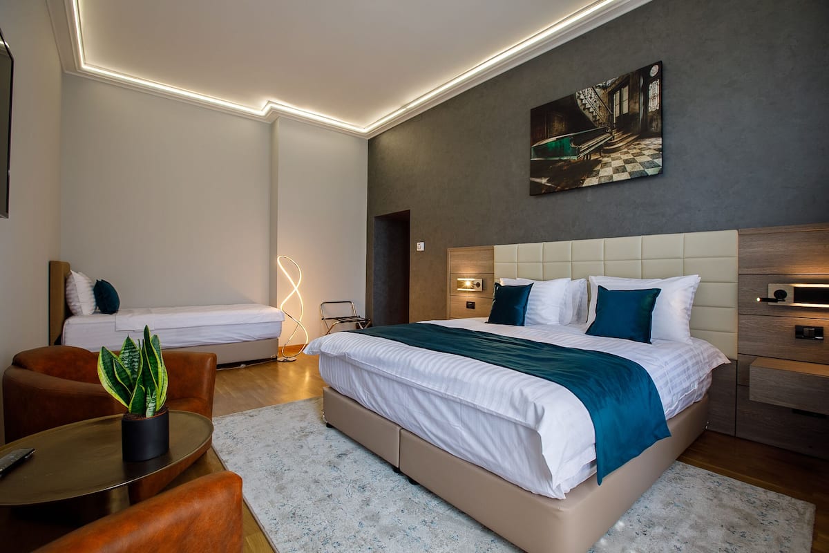 Family Room | 1 bedroom, premium bedding, pillowtop beds, minibar