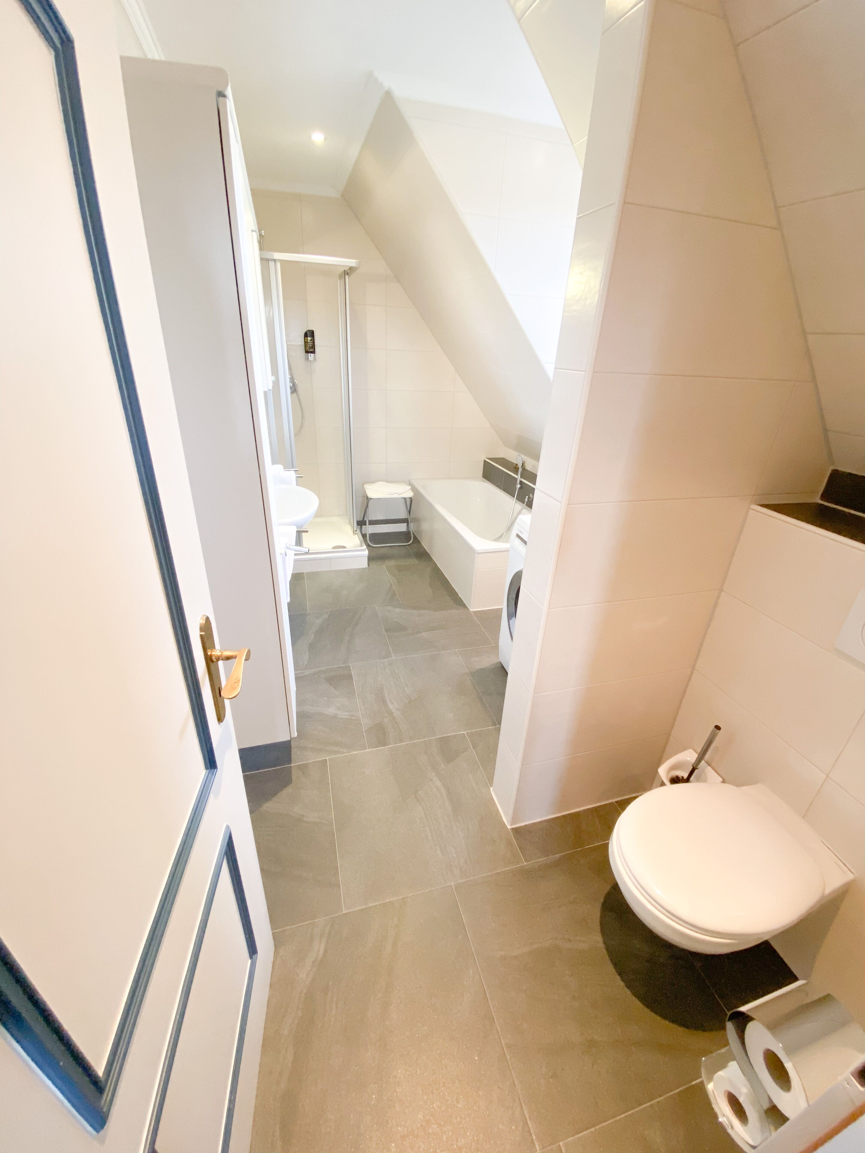 basic condo | bathroom | hair dryer, towels, soap, shampoo