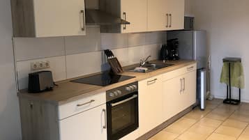 Apartemen Deluks, 3 kamar tidur | Dapur pribadi | Lemari es, microwave, oven, dan kompor