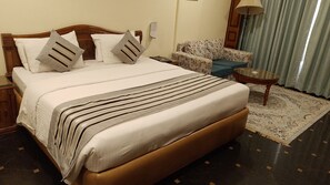 Deluxe Room | Minibar, in-room safe, desk, laptop workspace - Empires Hotel Bhubaneswar (Bhubaneshwar)