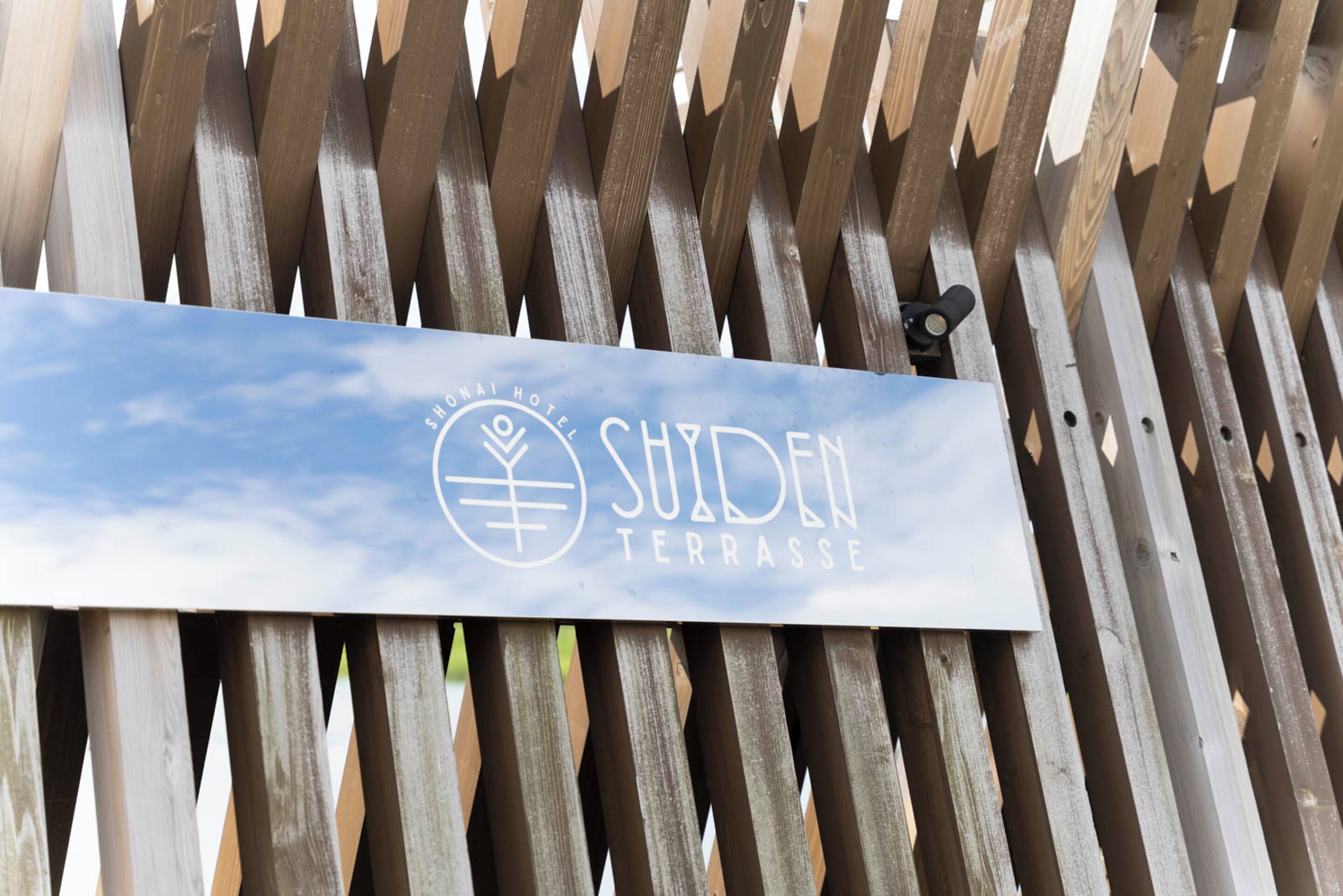 A sign for Shiden Terrace at Shonan Hotel.