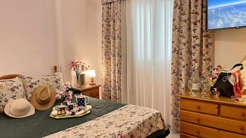 1 habitación, insonorización y tabla de planchar con plancha